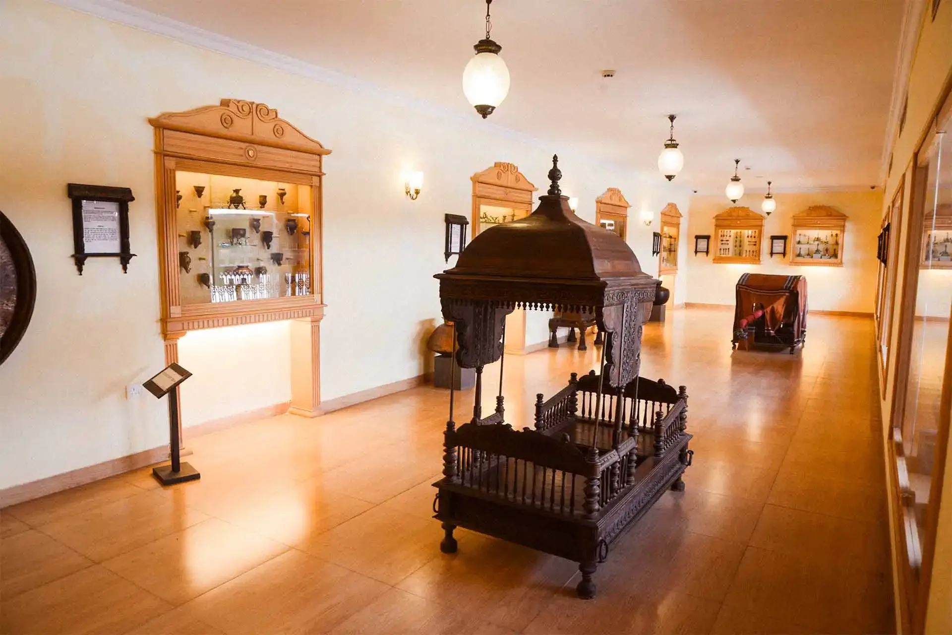 Ornate palkhi palanquin in the Aai Museum at Fort JadhavGadh