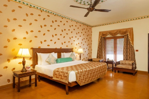 Experience Kholi Deluxe Room at Heritage Resort in Pune