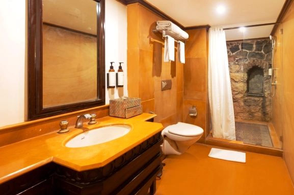 Experience Kholi Deluxe Room at Heritage Resort in Pune